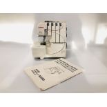 A JANOME 9200D OVERLOCKER ELECTRIC SEWING MACHINE WITH INSTRUCTIONS (NO FOOT PEDAL) - SOLD AS SEEN