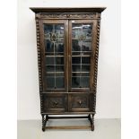 ART NOUVEAU STYLE OAK 2 DOOR GLAZED CABINET WITH BARLEY TWIST DETAIL