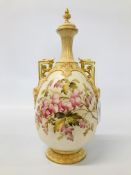A ROYAL WORCESTER HANDPAINTED TWIN HANDLED VASE WITH COVER