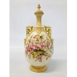 A ROYAL WORCESTER HANDPAINTED TWIN HANDLED VASE WITH COVER