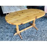 A SOLID HONEY PINE BREAKFAST TABLE L135cm x W75cm