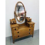 AN ATTRACTIVE SATINWOOD TWO DRAWER DRESSING CHEST WITH OVAL MIRROR