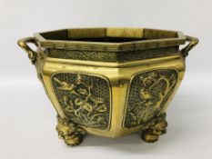 A HEAVY BRASS OCTAGONAL ORIENTAL DECORATED JARDINIERE W37cm H27cm