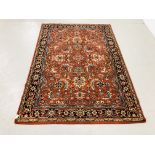 AN ORANGE/BLUE KASAK EASTERN DESIGN RUG, 2.16M X 1.