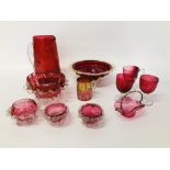 A GROUP OF CRANBERRY GLASSWARE TO INCLUDE THREE CUPS, JUG, SMALL BASKET WITH WIREWORK HANDLE,