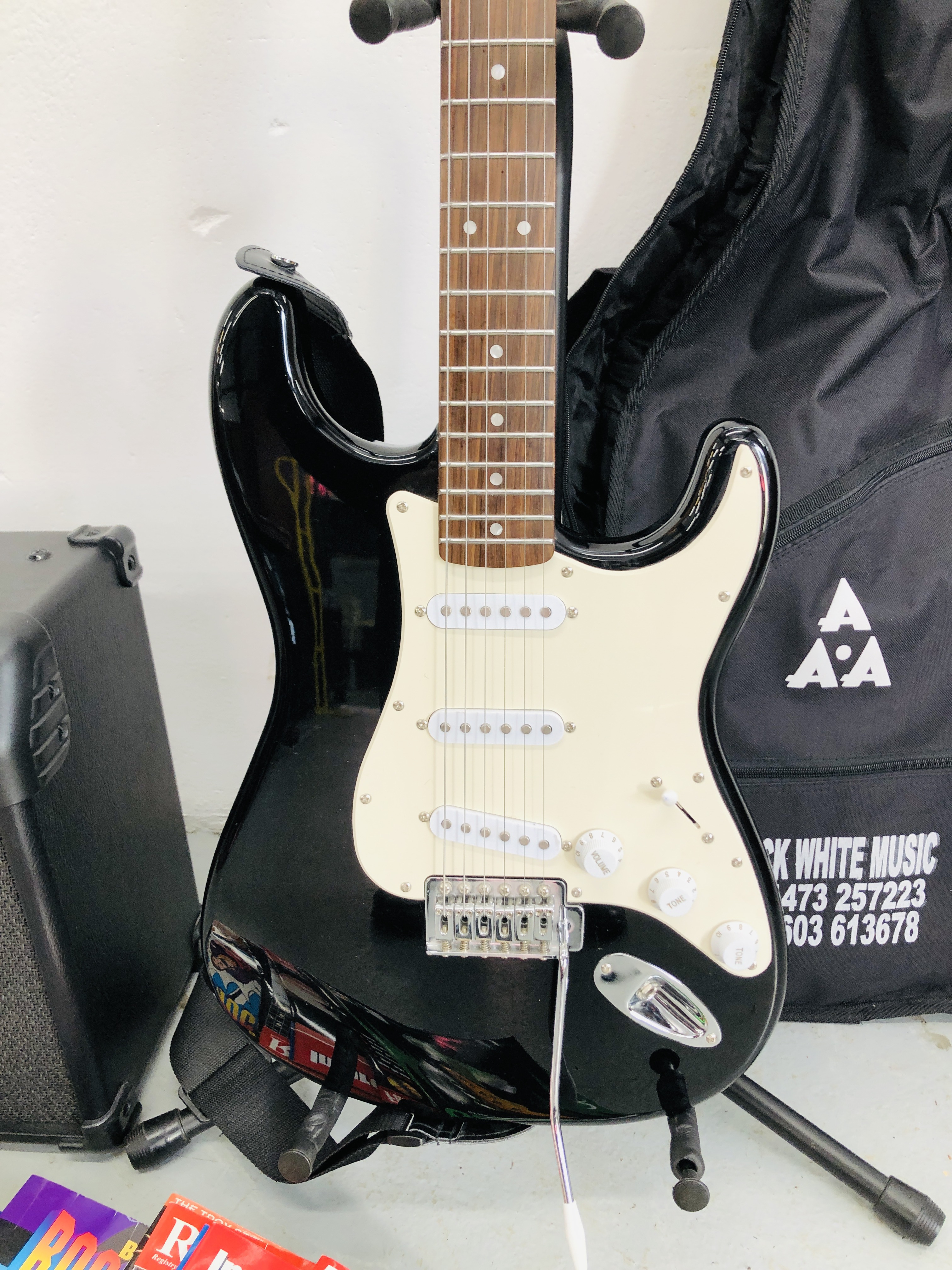 FEND SQUIER ELECTRIC GUITAR WITH A STAND & GUITAR BOOKS + LINE 6 AMP SPIDER IV 15 - SOLD AS SEEN - Image 2 of 7
