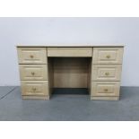 A LIGHT ASH EFFECT FINISH 6 DRAWER KNEEHOLE DRESSING CHEST