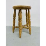 A HANDMADE STOOL WITH ELMWOOD SEAT