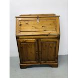 A DUCAL HONEY PINE FITTED BUREAU, WIDTH 87CM, HEIGHT 115CM,