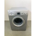 A BOSCH 1200 SILVER FINISH WASHING MACHINE - SOLD AS SEEN