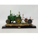 A JULIANA COLLECTION ORNAMENT OF VINTAGE TRACTOR WITH CULTIVATOR AND DOG - LENGTH 37CM. HEIGHT 20CM.