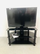 PANASONIC 39 INCH TV MODEL TX - L32 C3B WITH REMOTE TOGETHER WITH A MODERN BLACK GLASS 3 TIER STAND