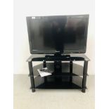 PANASONIC 39 INCH TV MODEL TX - L32 C3B WITH REMOTE TOGETHER WITH A MODERN BLACK GLASS 3 TIER STAND