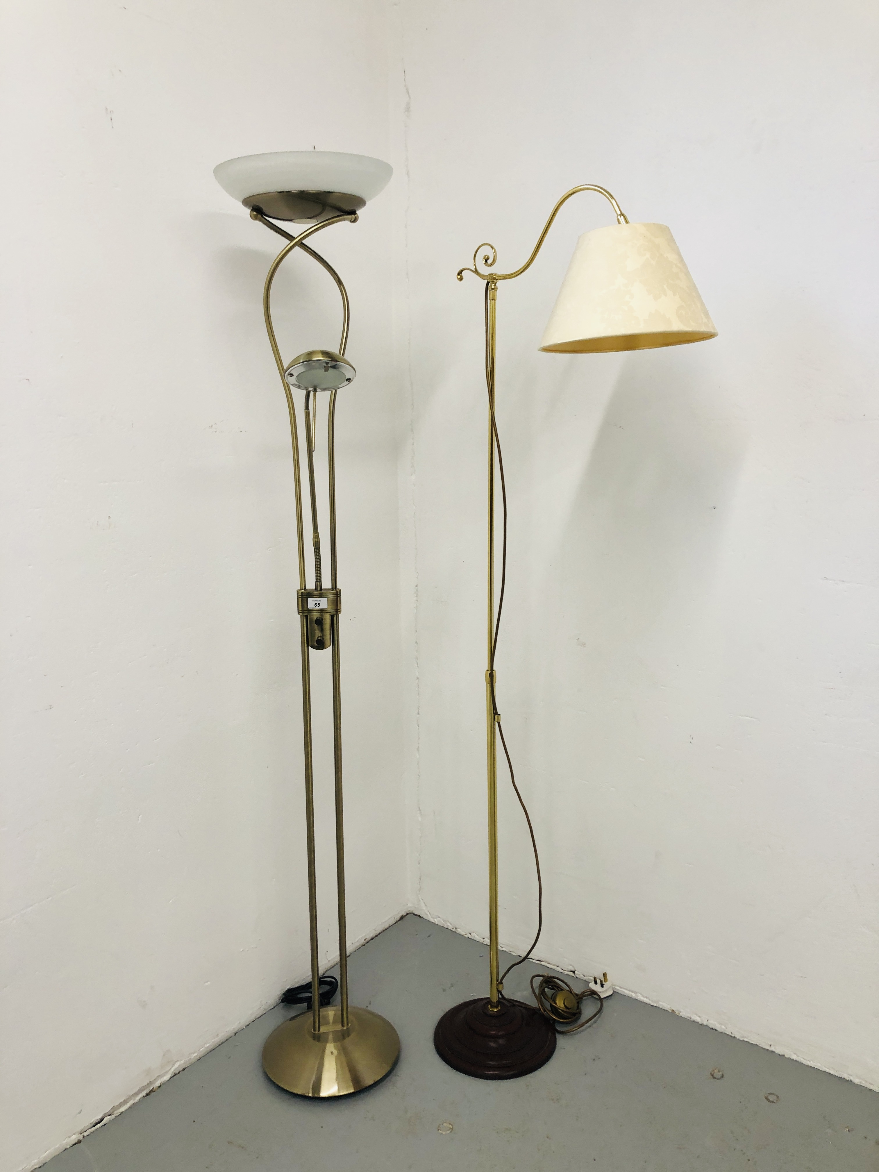 A MODERN DESIGNER UPLIGHTER WITH READING LIGHT AND ONE OTHER MODERN LAMP STANDARD - SOLD AS SEEN