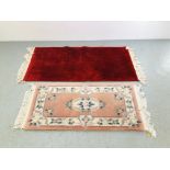 A QUALITY CRIMSON RED RUG WITH SHADOW PRINT DESIGN. L 155CM. W 77CM. AND A CHINESE DEEP PILE RUG.