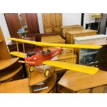 A LARGE MODEL RADIO CONTROLLED AIRCRAFT FITTED WITH ENGINE COMPLETE WITH TRANSMITTER AND
