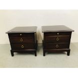 A PAIR OF STAG MINSTRAL TWO DRAWER BEDSIDE CHESTS WITH SLIDES