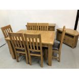 LIGHT OAK EXTENDING DINING TABLE AND SIX CHAIRS,