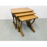 A NEST OF THREE NATHAN TEAK RETRO GRADUATED OCCASIONAL TABLES