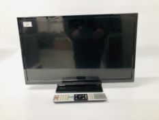 A TOSHIBA 24 INCH TELEVISION WITH REMOTE.