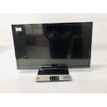 A TOSHIBA 24 INCH TELEVISION WITH REMOTE.