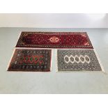 A RED PATTERNED HOSSIENABAD PERSIAN STYLE HALL RUNNER. L 200CM. W 67CM.