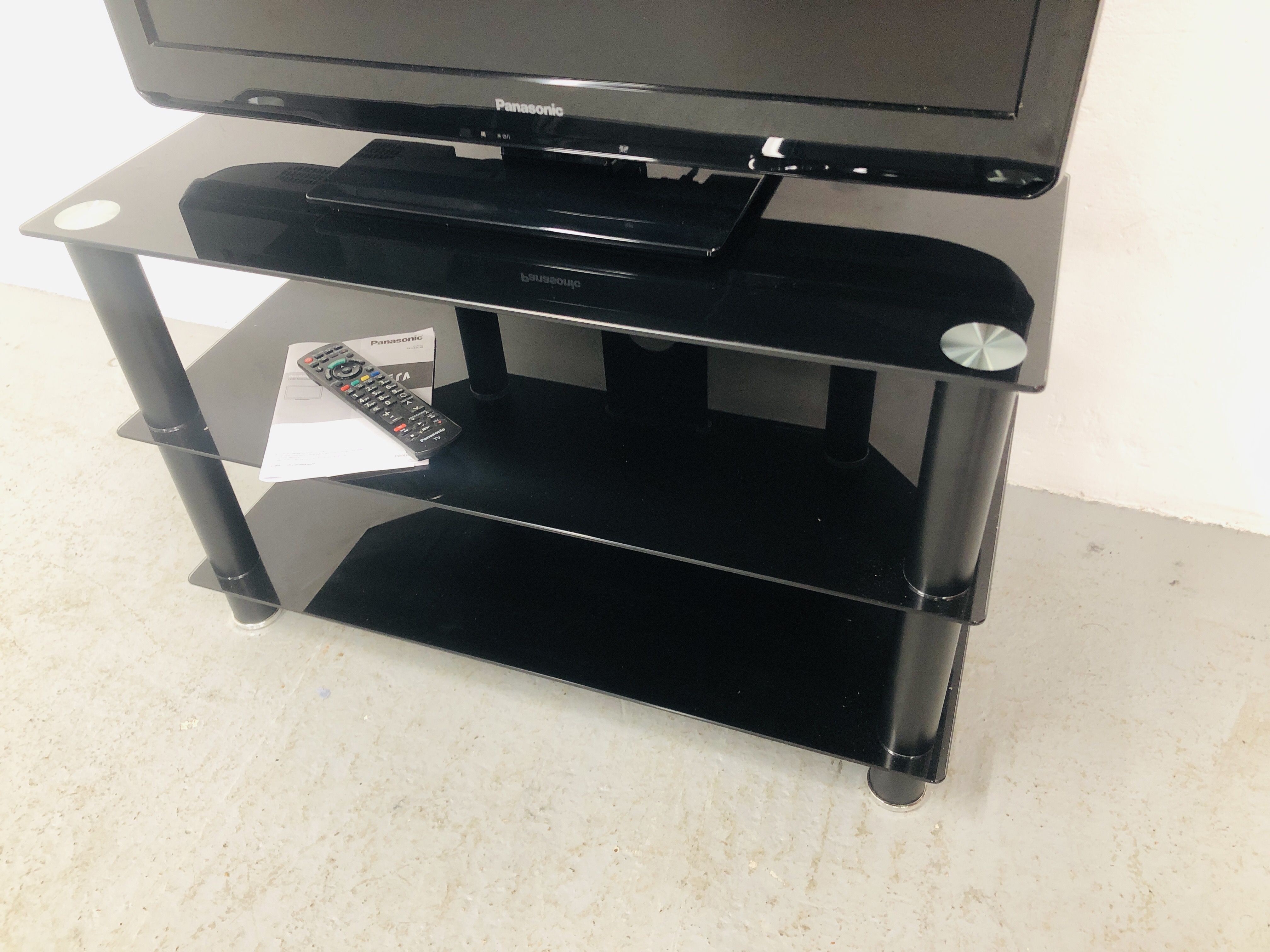 PANASONIC 39 INCH TV MODEL TX - L32 C3B WITH REMOTE TOGETHER WITH A MODERN BLACK GLASS 3 TIER STAND - Image 6 of 6