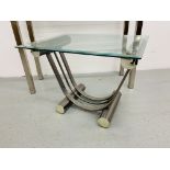 A STAINLESS STEEL DESIGNER SIDE TABLE WITH GLASS TOP LENGH 100cm HEIGHT 80cm DEPTH 35cm ALONG WITH