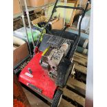 A MOUNTFIELD PETROL DRIVEN GARDEN SCARIFIER