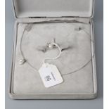 A diamond and pearl necklace and ring en suite, the necklace with single stone cultured pearl and