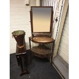 A George III mahogany corner wash stand, together with a mahogany Sutherland table, a mahogany swing