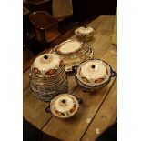 An extensive Woodsware 'Nile' pottery dinner service, with meat plates in sizes, covered tureens,