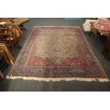 An old Isphan carpet of ivory ground, with single mihrab and flowering tree, with roosting birds