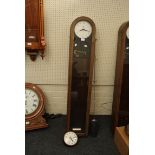 A STC of London vintage solenoid master clock, with oak case and Smith's salve dial