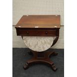 A William IV figured rosewood work table, with single frieze drawer and work bag below on a