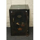 A Thomas Withers & Sons bent steel safe, with key mechanism, 54cm