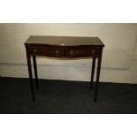 A reproduction mahogany serpentine serving table, with two frieze drawers, 97cm wide