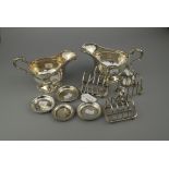 A pair of late Victorian heavy silver gravy boats in the George III style, London 1893, together
