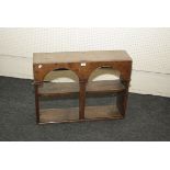 An oak 18th century arcaded wall shelf, with plain pilasters, 81cm wide