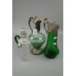 A silver collared dimpled glass claret ewer with globe stopper and green loop handle. Together