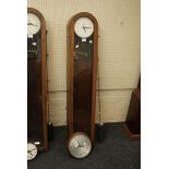 An STC of London vintage solenoid master clock, with oak case and Smith's slave dial