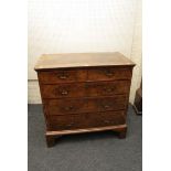 A Queen Anne walnut chest of drawers, with quarter veneered top over two short and three long