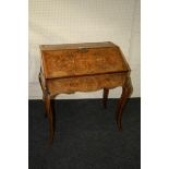 A 19th century French walnut and marquetry bureau de dame with cabriole legs, 81cm wide