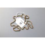 A fancy rope twist chain, marked 10K, 52cm length 9g