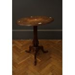 A Victorian walnut and marquetry oval top table with open work column and tripod base, 61cm wide