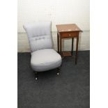 An Edwardian inlaid mahogany single drawer urn table, together with a Victorian nursing chair