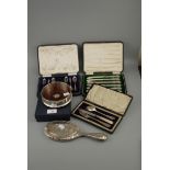 A cased Edwardian christening set, comprising a knife, fork and spoon, engraved decoration and