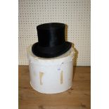 A Dunn and Co French silk top hat, 7 3/8, in card case