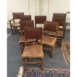 A set of eight 'Cromwellian' style oak and hide dining chairs, six single and two elbow chairs