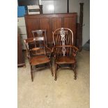 A near pair of 18th century oak Country dining chairs, each with vase splat and solid seat, together